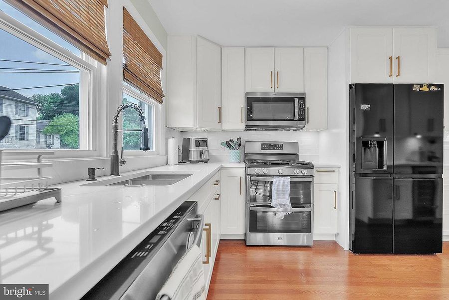 Renovated kitchen with quartz counters