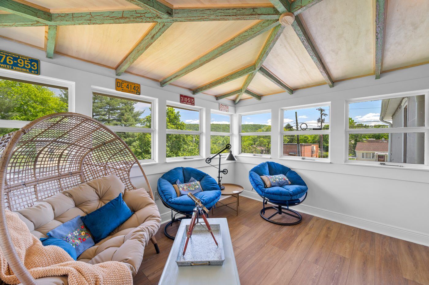 The bright restored sunroom at the Craven House