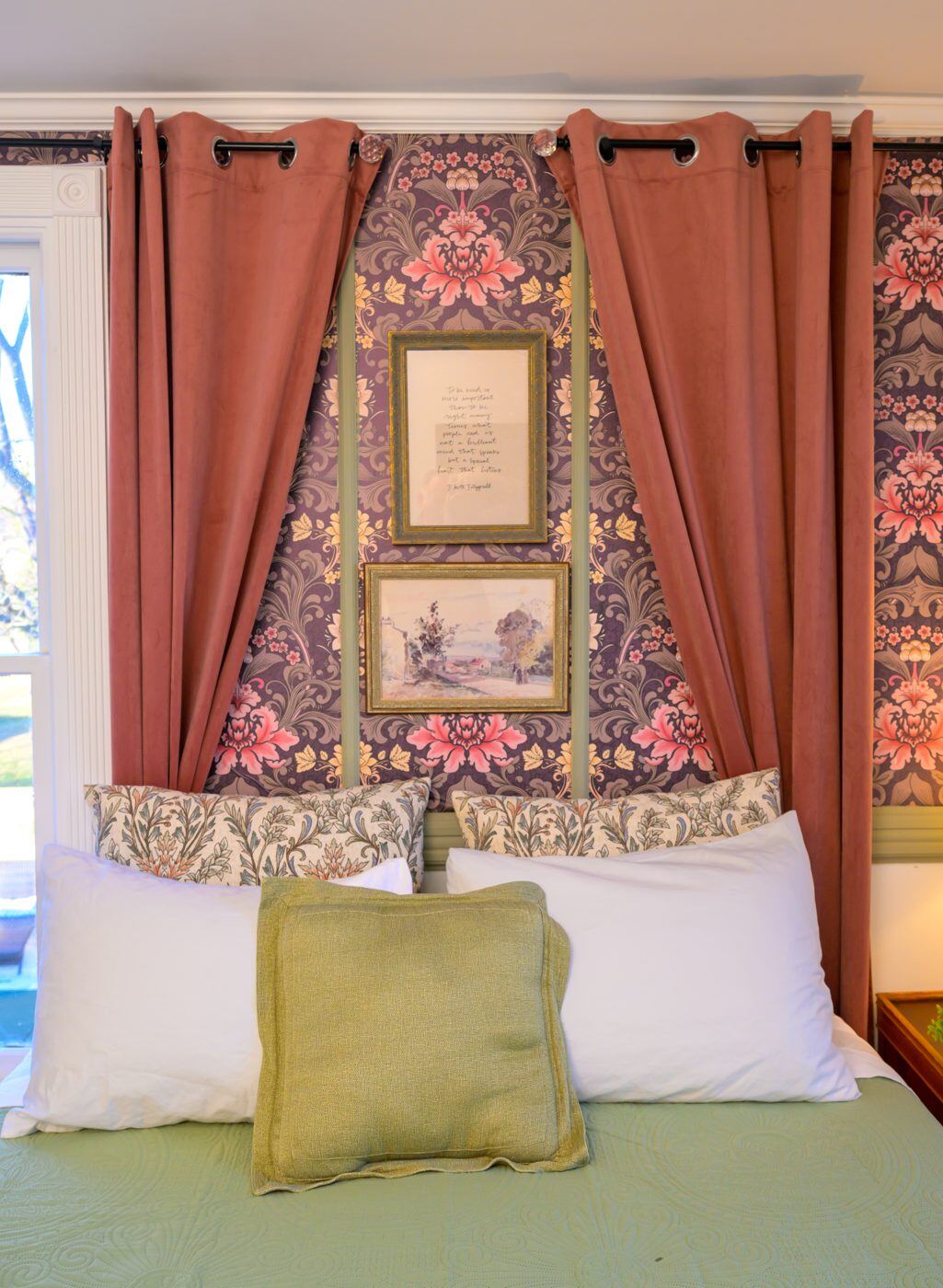 A window framed in coral drapery at the Craven House